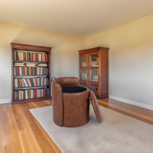 round-faux-leather-storage-pouffe-with-detachable-back-support