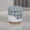 Grey and white abstract print upholstered stool detail