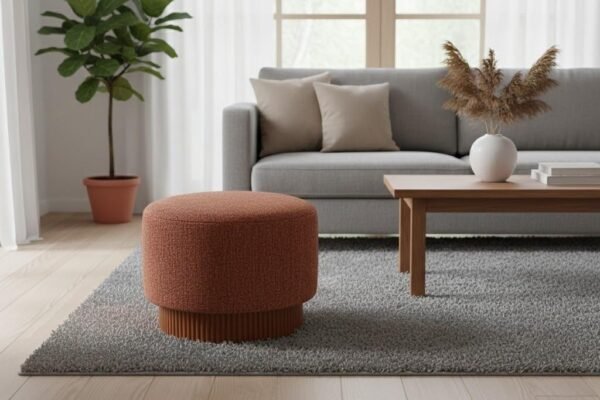 Modern round ottoman with ribbed pedestal base manufacturer