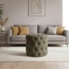 Internal storage space of boucle ottoman with wooden frame detail