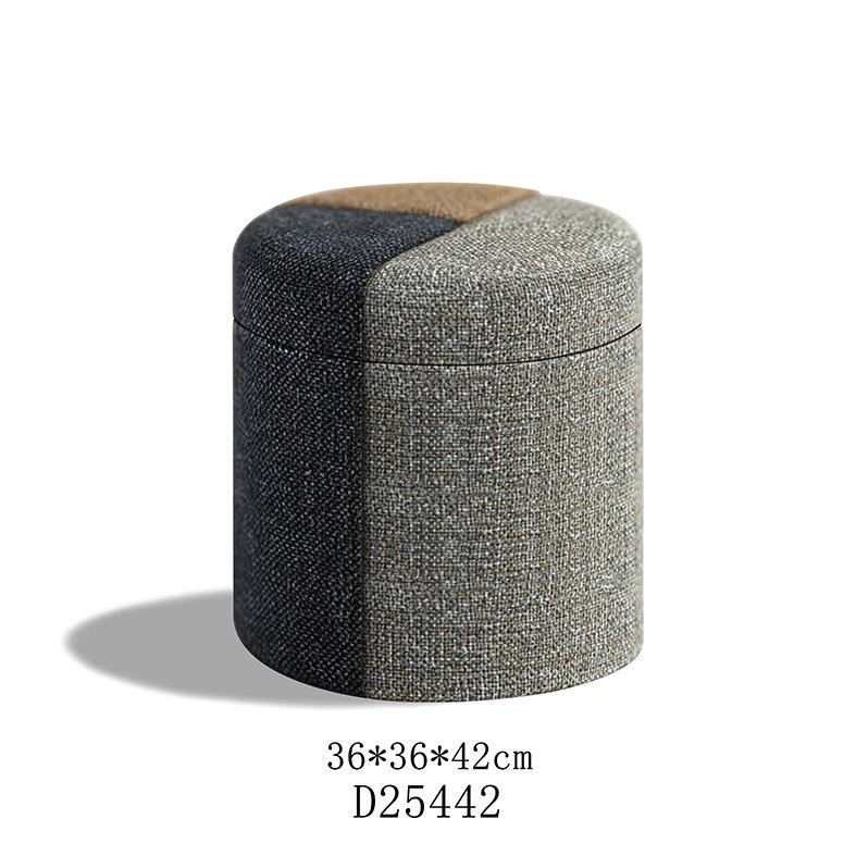 Modern round ottoman featuring high-performance velvet upholstery, kiln-dried hardwood frame, and professional commercial-grade construction for interior design projects.