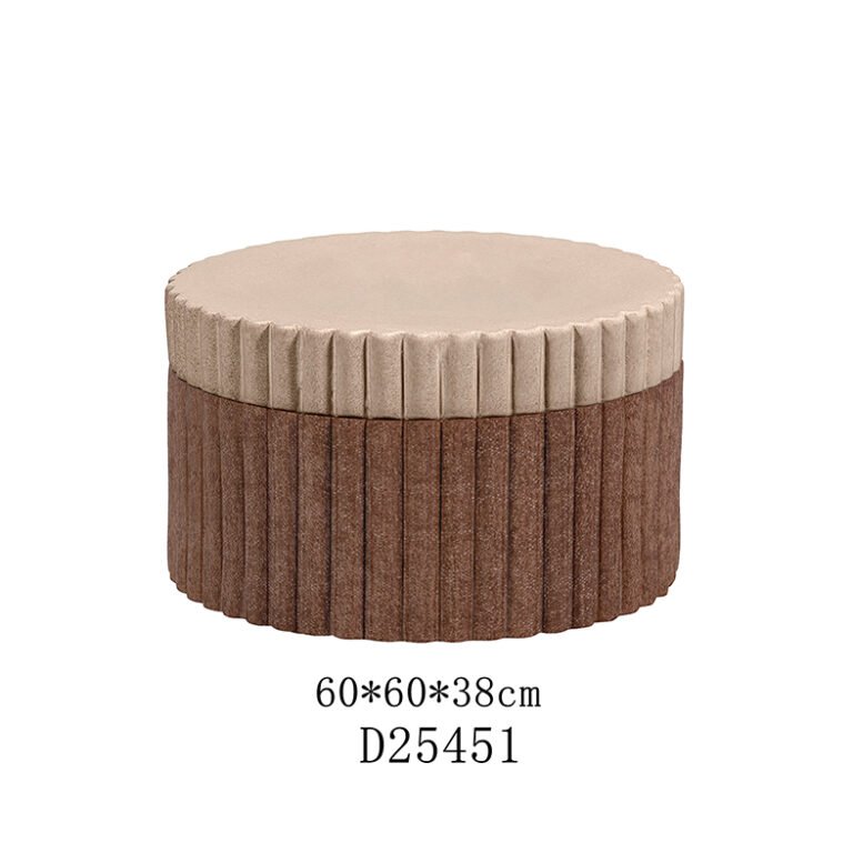 High-end oval ottoman with hardwood frame and performance velvet upholstery, designed for luxury hospitality and retail interior projects.