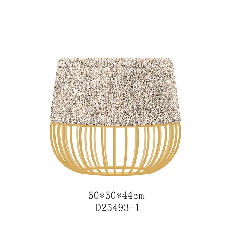 A luxurious gold storage ottoman with plush upholstery and a polished gold base, styled as a chic coffee table in a modern living room.