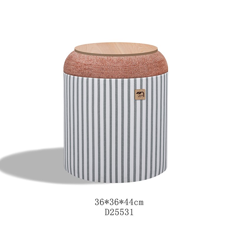 A sophisticated oval storage ottoman with plush upholstery and a sleek wooden base, styled as a chic centerpiece in a modern living room.