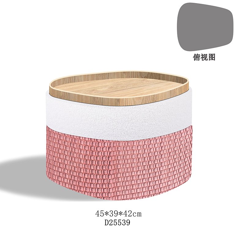 A sculptural hexagonal geometric ottoman with a textured fabric finish, serving as a sophisticated focal point in a minimalist living room.