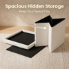 A stylish white faux-fur storage stool designed to keep spaces tidy. The image shows the deep storage compartment holding various personal items, blending organization with modern home decor