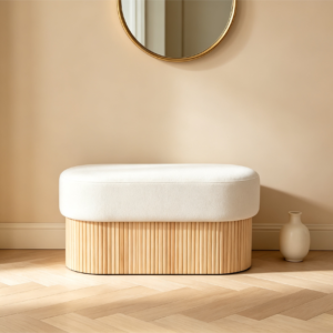 Modern cream oval storage ottoman bench featuring a fluted wood base, perfect for contemporary living rooms or bedrooms.