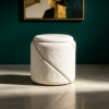 White round textured fabric storage ottoman set in modern living room