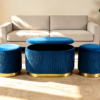Close-up of pleated detail on navy blue velvet storage ottoman set