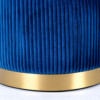 Navy blue velvet storage ottoman set tucked together for space-saving