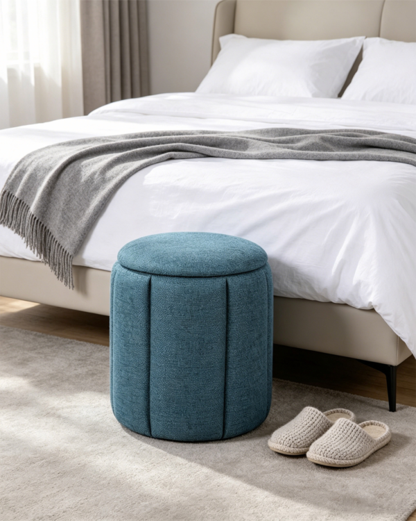 Blue Pleated Linen Ottoman Footstool in Modern Living Room Blue pleated linen round stool used as side table in modern living room corner