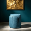 Blue Pleated Linen Ottoman Footstool in Modern Living Room Blue pleated linen ottoman used as a vanity stool in a cozy bedroom setting