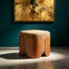 Close-up view of textured beige fabric and curved wooden leg accents on square ottoman
