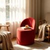 Modern square fabric upholstered ottoman coffee table with curved wooden legs placed in a contemporary living room decor