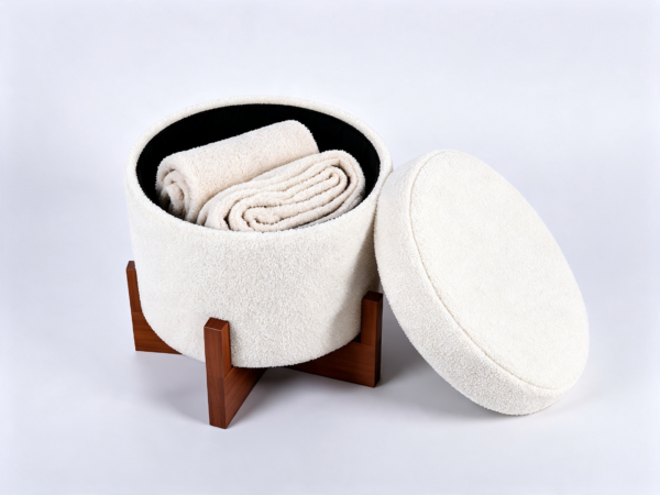 Open white teddy boucle round storage ottoman displaying interior hidden storage space