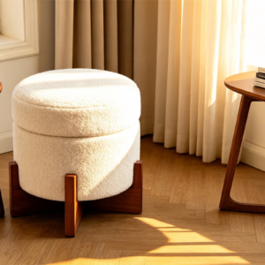 Modern white teddy boucle round storage ottoman featuring natural wooden legs, perfect for cozy living rooms and modern home decor.