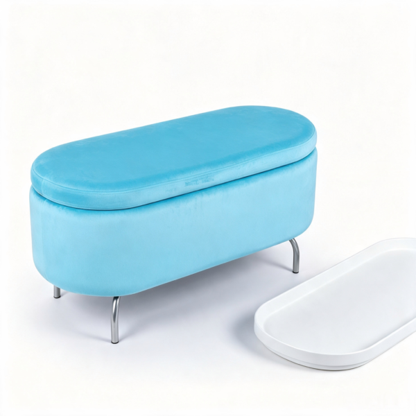 Light blue velvet oval storage ottoman with gold metal legs, shown on a white background with top lid turned over as a serving tray holding coffee cups.
