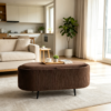 Open brown upholstered ottoman displaying spacious interior storage compartment
