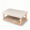 Top 1 Tufted Ottoman Coffee Table Designs with Wooden Tray | Fuzhou Victor Square beige tufted upholstered ottoman coffee table featuring a light natural wood frame, turned legs, and lower open storage shelf.