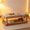 Top 1 Tufted Ottoman Coffee Table Designs with Wooden Tray | Fuzhou Victor Square tufted ottoman coffee table styled in a cozy living room with warm lighting and a wooden tray.