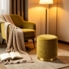 Open mustard yellow velvet ottoman showing interior storage space
